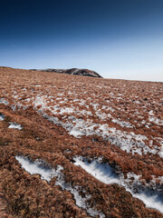 Snowy volcanic summit in Auvergne