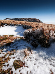 Snowy volcanic summit in Auvergne