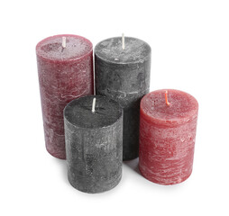 Wax candles on white background