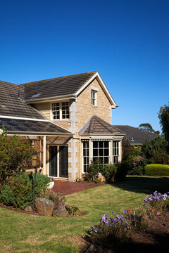 Large Sandstone Home With Formal Garden