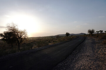 The deserted road of the village of Jodhpur || landscape from jodhpur || jodhpur village || jodhpur rajasthan || Deserted road || road with blue sky