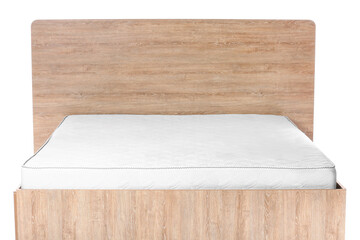 Bed with modern orthopedic mattress on white background