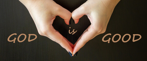 Inspirational motivational quote - God is good with woman making heart shape on dark background....