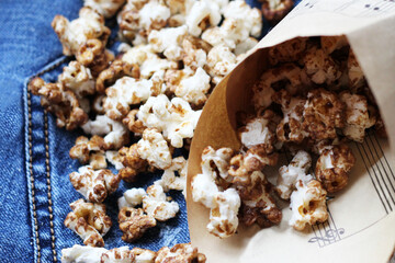 Delicious popcorn in a paper bag