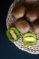 kiwi on black  background. tinting. selective focus