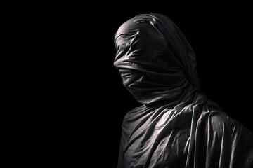 Fototapeta na wymiar Portrait of a scary ghost isolated on black background