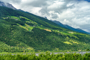 Naklejka na ściany i meble Summer landscape along the cycleway of the Venosta valley