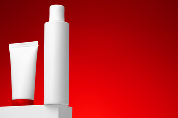 Blank cosmetic skincare container against red background