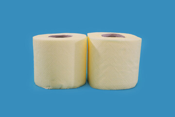  rolls of toilet paper on a blue background.