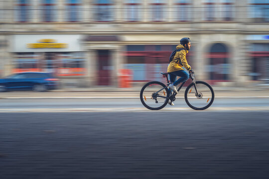 Side view of a boy on a bike, with panning technique.