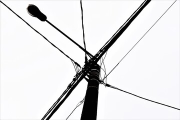 street lamp and electric wires on a pole