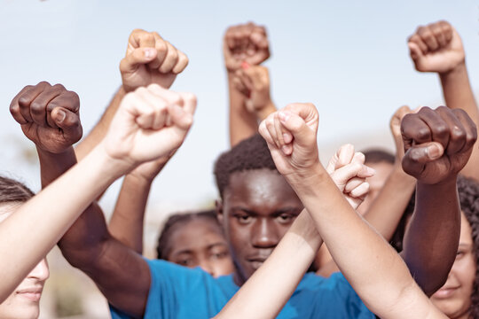 People Raised Fist Air Fighting For Their Rights. Labor Movement, Election Movement, No Racism, No Lockdown,  No Coronavirus (covid 19), Deniers And Union Concept.