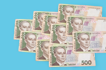 Ukrainian hryvnia on a blue background. 500 hryvnia banknotes.