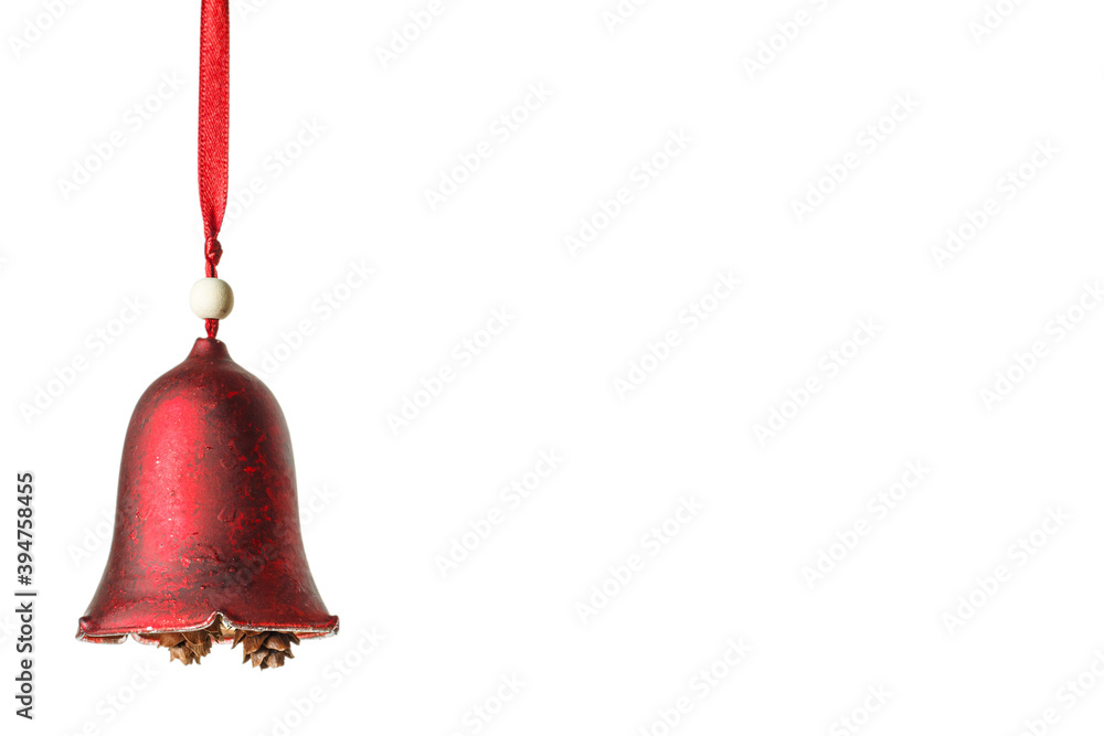 Wall mural vintage red bell with pine cones hanging on red ribbon isolated on white background