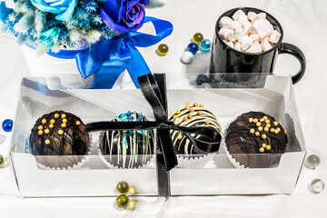 Set of chocolate bombs in giftbox with mini marshmallows, white chocolate, milk chocolate, hot...