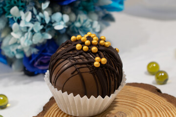 Milk chocolate bomb with mini marshmallows, white chocolate, milk chocolate and hot cocoa....