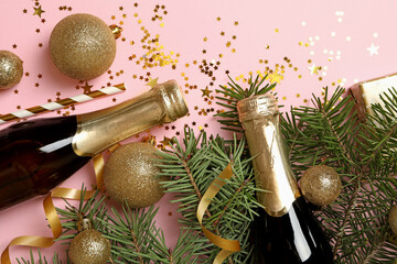 New year accessories and champagne bottles on pink background