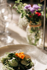 edible orange flower on salad 