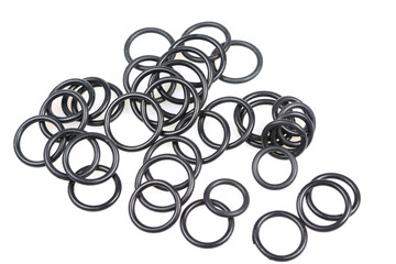 several sealing rings of different sizes in black close-up
