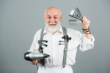 Senior bearded man, bearded old male. Portrait of vintage barber. Barber scissors and straight...