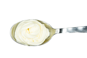 Mayonnaise on spoon isolated on white background top view