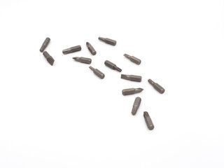 Replacement bits scattered on a gray background