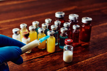 Investigación, vacunación. Vacunas e inyección. Protección sanitaria ante enfermedades.