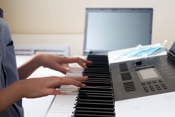 Fototapeta na wymiar Education online. Learning for music at home.