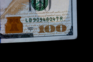 Selective focus on detail of 100 dollars banknote. Close up macro detail of money banknotes,...