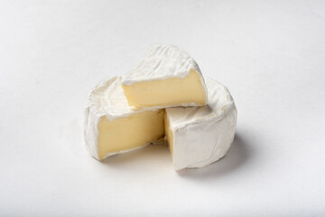 Cheese with white mold. Cheese on a white background. Cheese with white mold on a white background for insulation.