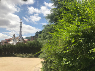 garden view near Colonnaded roadway, by Antoni Gaudi in Park Guell, Barcelona, Catalonia, Spain