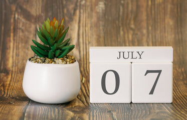 Flower pot and calendar for the warm season from 07 July. Summer time.