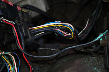 Oxidized damaged ignition wire in the car. The ignition switch wire is broken. Broken wire. Broken...