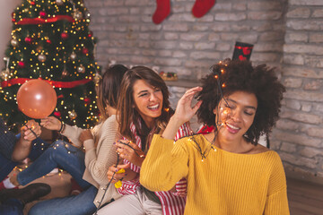 Friends getting ready for New Year's Eve party