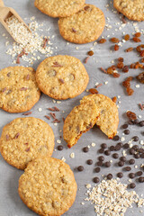 Homemade tasty oatmeal cookies with raisins, and chocolate chips. Healthy snack concept. Sweet dessert. 