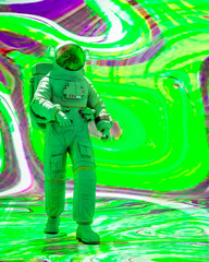 astronaut is walking in a psychedelic background
