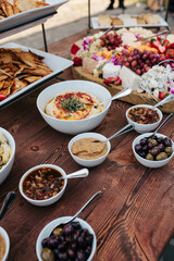 event spread with olives, hummus, cheese and fruit platter