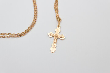 Fototapeta na wymiar Cross gold, a symbol of the Christian faith