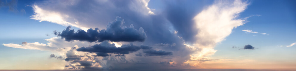 Dramatic Panoramic View of a cloudscape during a cloudy and colorful sunset. Taken over Havana, Cuba.