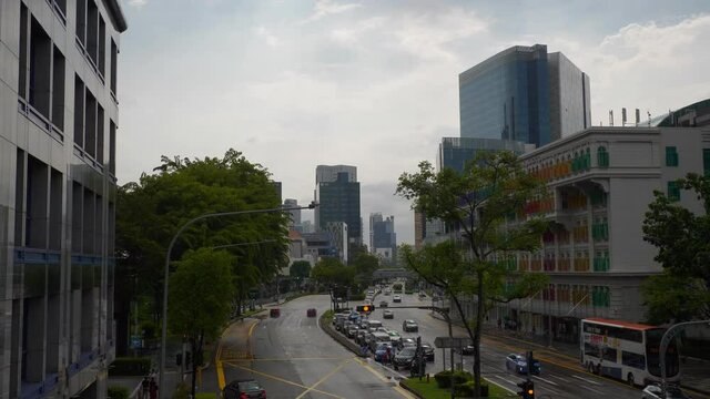 coudy day singapore city center traffic street pedestrian bridge slow motion panorama 4k