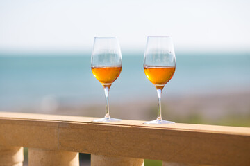 Beautiful scene with wine glasses standing alone