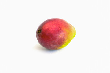 Fresh raw, red and green tropical fruit mango concept. Close-up on a white isolated background.