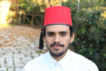 Arabic man wearing fez hat
