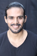 Obraz premium Handsome young ethnic man portrait