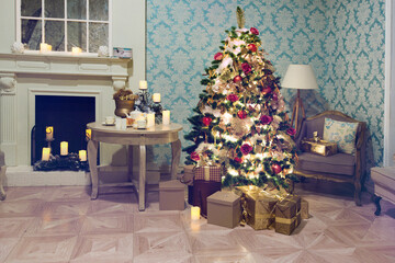 Luxury interior of living room with decorated Christmas tree and gifts on the wooden floor