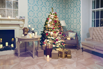 Luxury interior of living room with decorated Christmas tree and gifts on the wooden floor