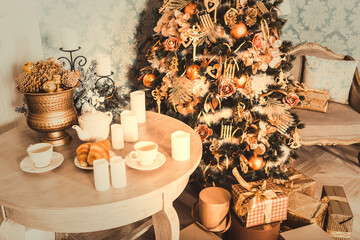 Luxury interior of living room with decorated Christmas tree and gifts on the wooden floor
