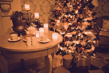 Luxury interior of living room with decorated Christmas tree and gifts on the wooden floor