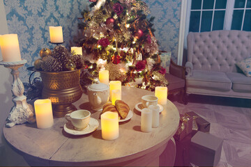 Luxury interior of living room with decorated Christmas tree and gifts on the wooden floor