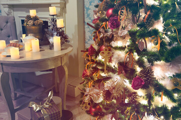 Luxury interior of living room with decorated Christmas tree and gifts on the wooden floor